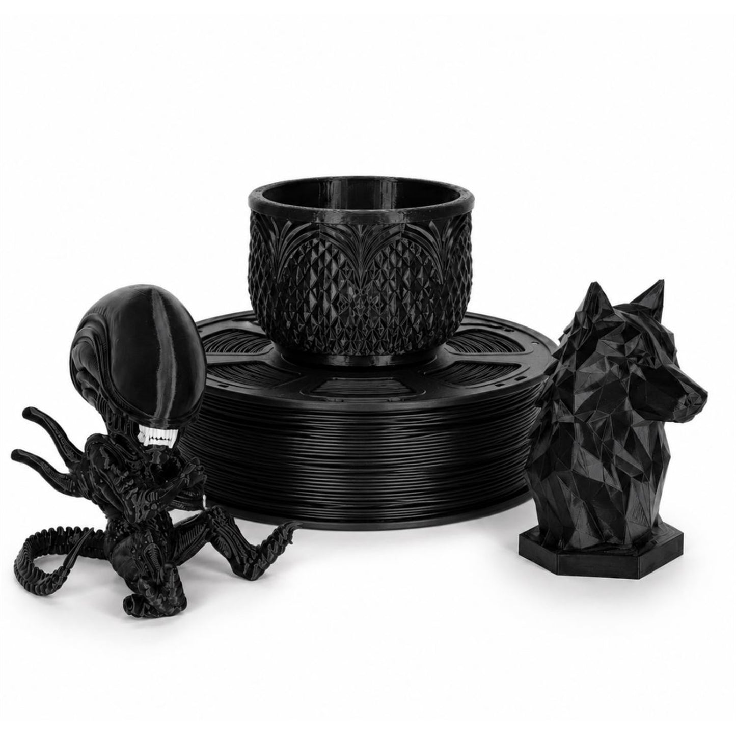 Black PLA spool with figurine and home decor print examples