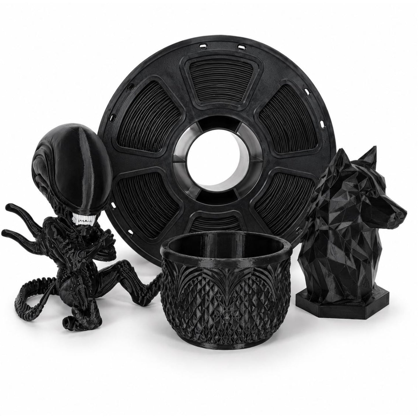Black PLA spool with sample figurine, planter, and wolf prints