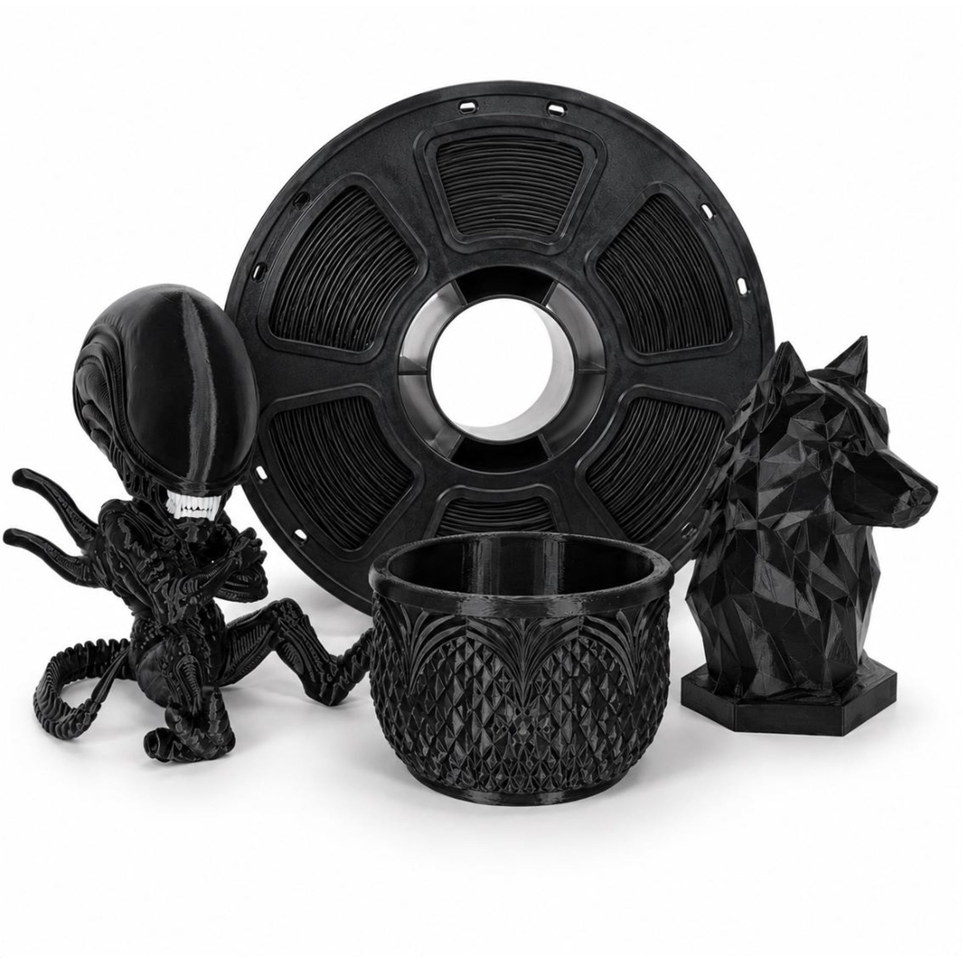 Black PLA spool with sample figurine, planter, and wolf prints
